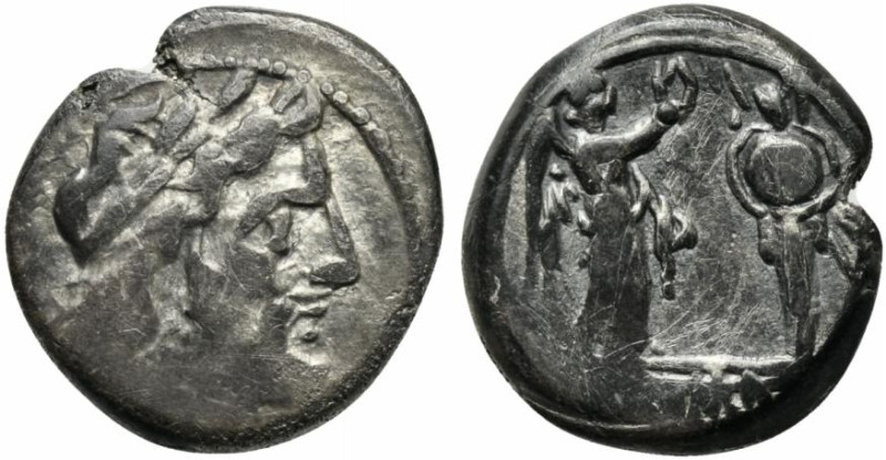 Anonymous, Sicily, 211-208 BC. AR Victoriatus (17mm, 3.29g, 11h). Laureate head ...