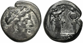 Anonymous, Sicily, 211-208 BC. AR Victoriatus (17mm, 3.29g, 11h). Laureate head of Jupiter r. R/ Victory standing r., crowning trophy. Crawford 70/1; ...