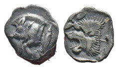 (Silver, 0.42g 10mm) Mysia, Kyzikos AR Hemiobol. Circa 450-400 BC.
Forepart of boar to left, tunny fish behind
Rev.Head of roaring lion to left; star ...