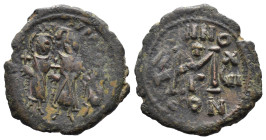 (Bronze, 4.83g 25mm) Phocas, with Leontia. 602-610. Follis Constantinople