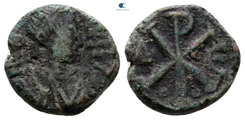 Justin I AD 518-527. Constantinople
Pentanummium Æ

13 mm, 2,02 g



very...