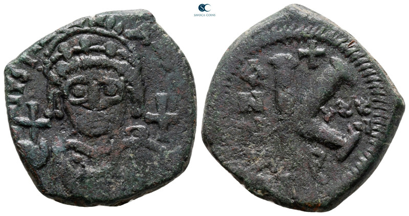 Justinian I AD 527-565. Theoupolis (Antioch)
Half Follis or 20 Nummi Æ

28 mm...