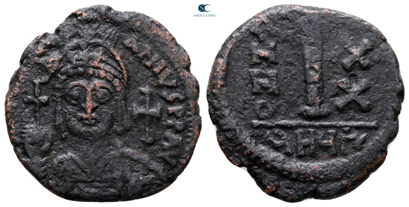 Justinian I AD 527-565. Theoupolis (Antioch)
Decanummium Æ

22 mm, 4,90 g

...