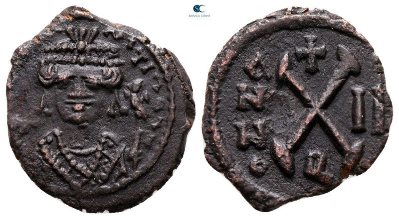 Tiberius II Constantine AD 578-582. Theoupolis (Antioch)
Decanummium Æ

18 mm...