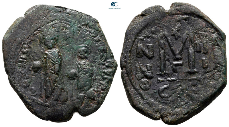 Heraclius with Heraclius Constantine AD 610-641. Constantinople
Follis or 40 Nu...