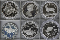 Lote 9 monedas. 1975 a 1992. GAMBIA, GIBRALTAR, GRAN BRETAÑA (2), IRLANDA (2), JERSEY, NUEVA ZELANDA, SANTA HELENA Y ASCENSIÓN. AR. Todas diferentes. ...