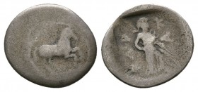 THESSALY, Pharkadon. Late 5th-early 4th centuries BC. AR Obol (0.7g, 11.3mm). 
 Horse advancing right / Athena standing right, holding spear and shie...