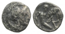 Southern Apulia, Tarentum, c. 380-325 BC. AR Diobol (10mm, 1.15g, 7h). Helmeted head of Athena r., helmet decorated with hippocamp. R/ Herakles kneeli...