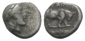 Southern Lucania, Thourioi, c. 443-400 BC. AR Triobol (9mm, 0.99g, 12h). Helmeted head of Athena r., helmet decorated with wreath. R/ Bull standing r....