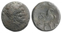 Macedon, Paroreia, c. 185-168 BC. Æ (14.5mm, 3.46g, 6h). Laureate head of Zeus r. R/ Eagle standing on thunderbolt right, head reverted; two monograms...