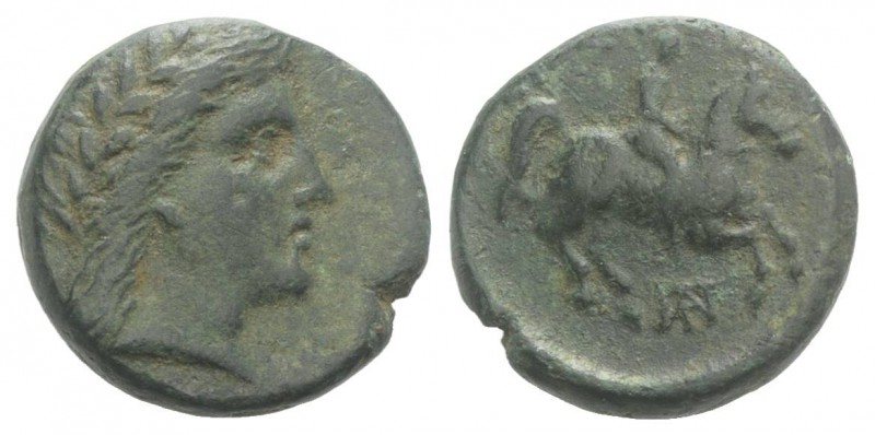 Uncertain mint, Æ (17mm, 5.06g, 12h). Laureate head of Apollo r. R/ Horseman r.;...