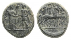Aeolis, Kyme, 2nd century BC. Æ (14mm, 4.52g, 12h). Artemis, holding long torch, greeting the Amazon Kyme, holding sceptre. R/ Two figures (Apollo and...