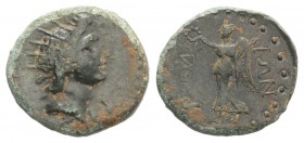 Islands of Caria, Rhodes, c. early-mid 1st century AD. Æ (18mm, 3.51g, 6h). Radiate head of Helios r. R/ Nike advancing l., holding wreath and palm. S...