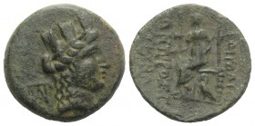 Cilicia, Hierapolis-Kastabala, c. 2nd-1st century BC. Æ (21mm, 6.46g, 12h). Turreted bust of Tyche r., monogram behind. R/ Goddess seated l., holding ...