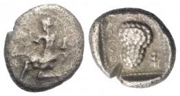 Cilicia, Soloi, c. 440-410 BC. AR 1/3 Stater (13mm, 2.52g, 7h). Amazon kneeling l., holding bow, wearing quiver and bowcase. R/ Grape bunch on stalk; ...