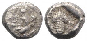 Cilicia, Soloi, c. 440-410 BC. AR 1/3 Stater (12mm, 3.43g, 12h). Amazon kneeling l., holding bow, wearing quiver and bowcase. R/ Grape bunch on stalk....