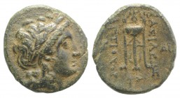 Seleukid Kings, Antiochos II (261-246 BC). Æ (18mm, 3.41g, 12h). Sardeis. Laureate head of Apollo r. R/ Tripod; H(?) to outer l., ΔI to outer r., anch...