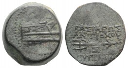 Seleukid Kings, Antiochos VII (138-129 BC). Æ (23mm, 11.60g, 12h). Antioch, year 174 (139/8 BC). Prow of galley r. R/ Trident; monogram in inner l., d...