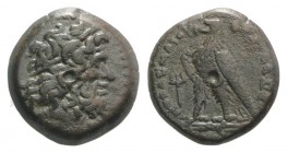 Ptolemaic Kings of Egypt, Ptolemy III (246-221). Æ (14mm, 2.49g, 12h). Alexandria. Head of Zeus-Ammon r., wearing tainia. R/ Eagle standing l. on thun...