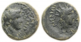 Tiberius (14-37). Lydia, Tripolis. Æ (18mm, 4.48g, 12h). Menandros Metrodoros, magistrate. Laureate head of Tiberius r. R/ Radiate head of Helios r. R...