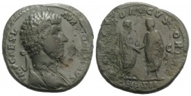 Lucius Verus (161-169). Æ Sestertius (32mm, 20.88g, 11h). Rome, AD 161. Laureate bust r., slight drapery. R/ Marcus Aurelius standing r., holding volu...