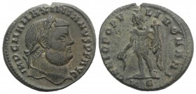 Maximianus (286-305). Æ Follis (27mm, 8.26g, 12h). Cyzicus, 295-6. Laureate head r. R/ Genius standing l., holding patera from which liquor flows and ...