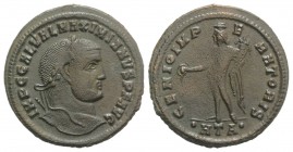 Galerius (305-311). Æ Follis (28mm, 7.70g, 12h). Heraclea, c. 308-9. Laureate bust r. R/ Genius standing facing, head l., holding cornucopia and pater...