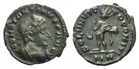 Constantine I (307-337). Æ Follis (19mm, 3.43g, 6h). Londinium, AD 318. Laureate and cuirassed bust r. R/ Sol standing l., raising hand and holding gl...