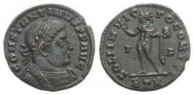 Constantine I (307/310-337). Æ Follis (19mm, 2.68g, 6h). Treveri, 313-5. Laureate and cuirassed bust r. R/ Sol standing l., raising hand and holding g...