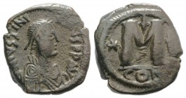 Justinian I (527-565). Æ 40 Nummi (29mm, 17.73g, 6h). Constantinople. Diademed, draped and cuirassed bust r. R/ Large M flanked by star and cross; CON...