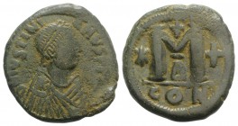 Justinian I (527-565). Æ 40 Nummi (31mm, 17.85g, 6h). Constantinople. Diademed, draped and cuirassed bust r. R/ Large M flanked by star and cross; Δ//...