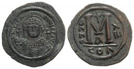 Justinian I (527-565). Æ 40 Nummi (41mm, 22.72g, 6h). Constantinople, year 13 (539/40). Helmeted and cuirassed facing bust, holding globus cruciger an...