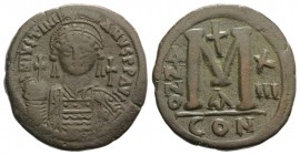 Justinian I (527-565). Æ 40 Nummi (38mm, 23.06g, 6h). Constantinople, year 13 (539/40). Helmeted and cuirassed facing bust, holding globus cruciger an...