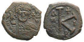 Justin II (565-578). Æ 20 Nummi (24mm, 8.54g, 11h). Theoupolis (Antioch), year 1 (565/6). Helmeted and cuirassed bust facing, holding Victory on globe...