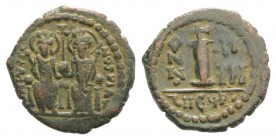 Justin II (565-578). Æ 10 Nummi (19mm, 2.98g, 6h). Theoupolis (Antioch), year 5 (569/70). Justin and Sophia enthroned facing, holding cross on globe b...