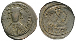 Tiberius II (578-582). Æ 30 Nummi (31mm, 10.03g, 6h). Nicomedia, 578-9. Crowned, draped and cuirassed facing bust. R/ Large XXX; cross above; NIKOA. M...