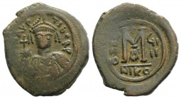 Maurice Tiberius (582-602). Æ 40 Nummi (32mm, 11.31g, 6h). Nicomedia, year 9 (590/1). Helmeted and cuirassed bust facing, holding globus cruciger and ...