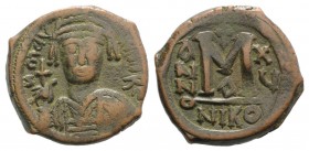 Maurice Tiberius (582-602). Æ 40 Nummi (27mm, 11.45g, 7h). Nicomedia, year 15 (596/7). Helmeted and cuirassed bust facing, holding globus cruciger and...