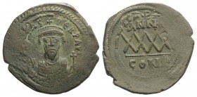 Phocas (602-610). Æ 40 Nummi (33mm, 12.26g, 1h). Constantinople, uncertain year. Crowned bust facing, wearing consular robes, holding mappa and crucif...
