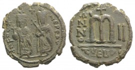 Phocas (602-610). Æ 40 Nummi (27mm, 10.72g, 6h). Theoupolis (Antioch), year 2 (603/4). Phocas and Leontia standing facing, the Emperor holding globus ...