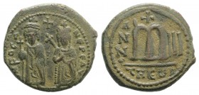 Phocas (602-610). Æ 40 Nummi (27mm, 10.15g, 6h). Theoupolis (Antioch), year 3 (604/5). Phocas and Leontia standing facing, the Emperor holding globus ...