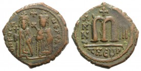 Phocas (602-610). Æ 40 Nummi (27mm, 9.99g, 6h). Theoupolis (Antioch), year 3 (604/5). Phocas and Leontia standing facing, the Emperor holding globus c...