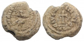 Late Roman-Byzantine Pb Seal (22mm, 9.44g, 11h). Phoenix standing r. R/ Cross. Cut on obv., near VF