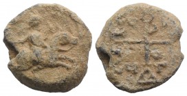 Byzantine Pb Seal, c. 7th-12th century (21mm, 12.88g, 12h). St. George on horseback r. R/ Cruciform monogram. Good Fine