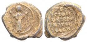 Byzantine Pb Seal, c. 7th-12th century (22mm, 8.28g, 12h). Saint standing facing, orans. R/ Legend in five lines. Near VF