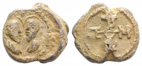 Byzantine Pb Seal, c. 7th-12th century (20mm, 7.32g, 12h). Confronted bust of saints, nimbate. R/ Cruciform monogram. VF