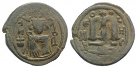 Islamic, Arab-Byzantine, Umayyad Caliphate. temp. 'Abd al-Malik ibn Marwan (AH 65-86 / AD 685-705). Æ Fals (22mm, 3.68g, 6h). Hims (Emesa), c. 685-690...