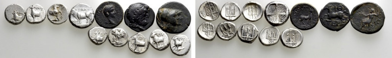 12 Greek and Roman Coins. 

Obv: .
Rev: .

. 

Condition: See picture.
...