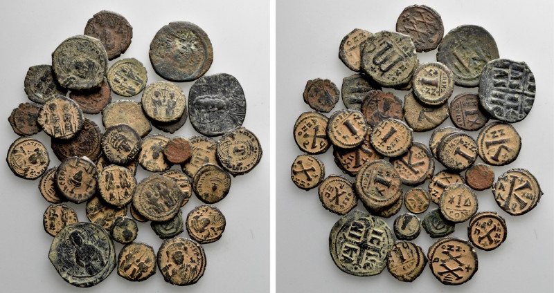 35 Byzantine Coins. 

Obv: .
Rev: .

. 

Condition: See picture.

Weigh...