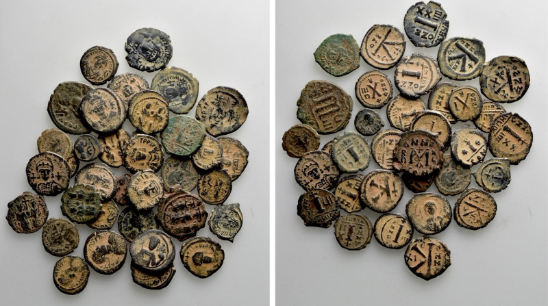 35 Byzantine Coins. 

Obv: .
Rev: .

. 

Condition: See picture.

Weigh...